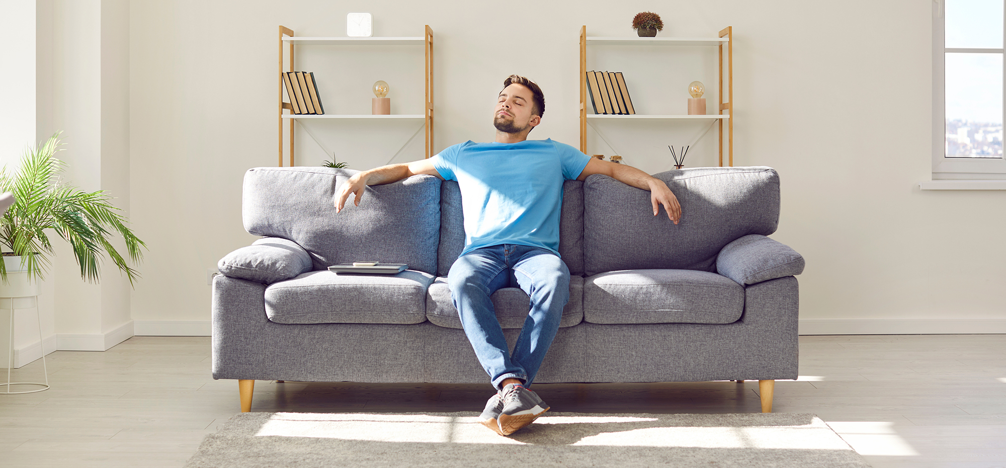man sitting on a couch